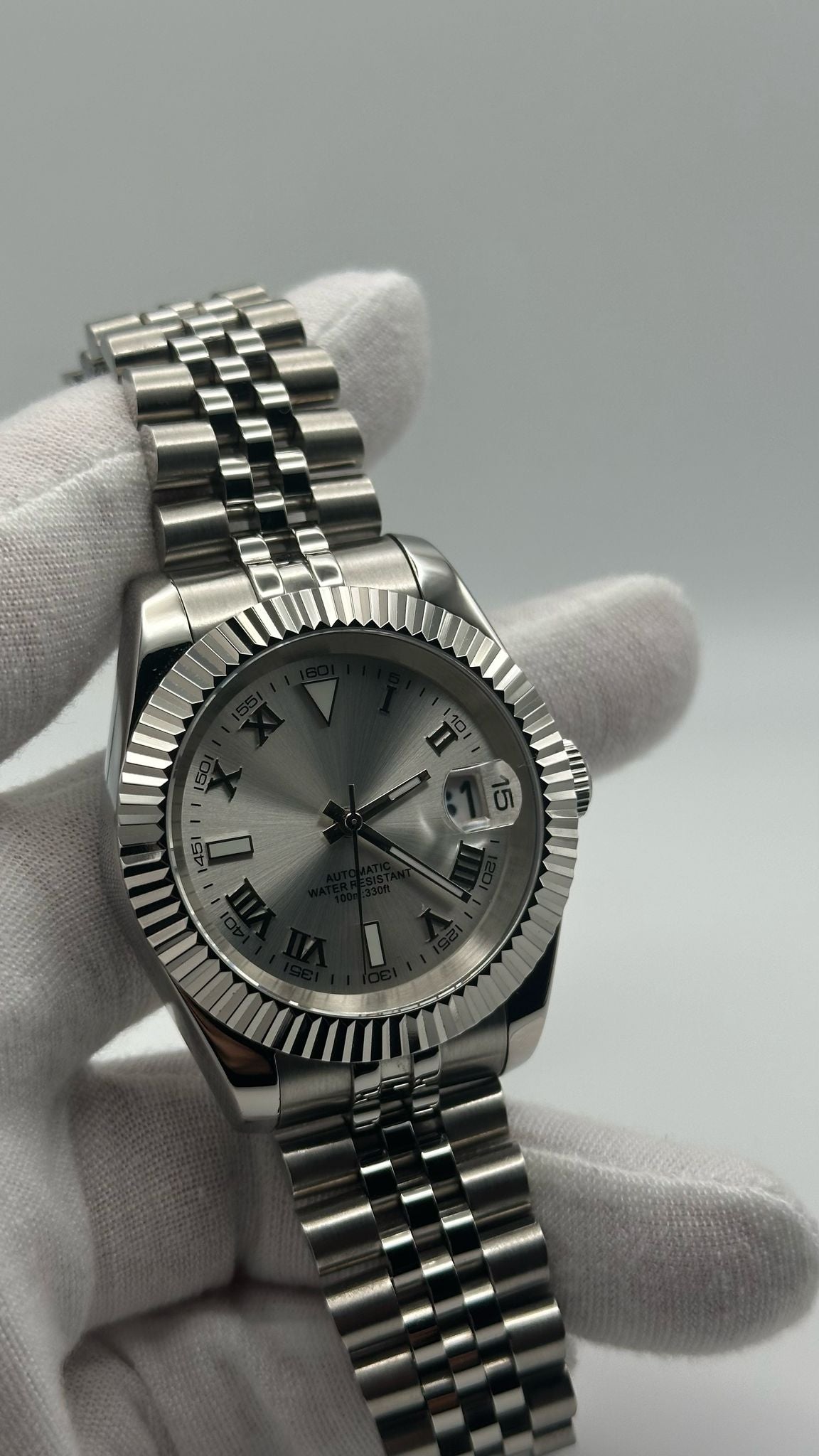 Silver Roman Numeral Dial Watch
