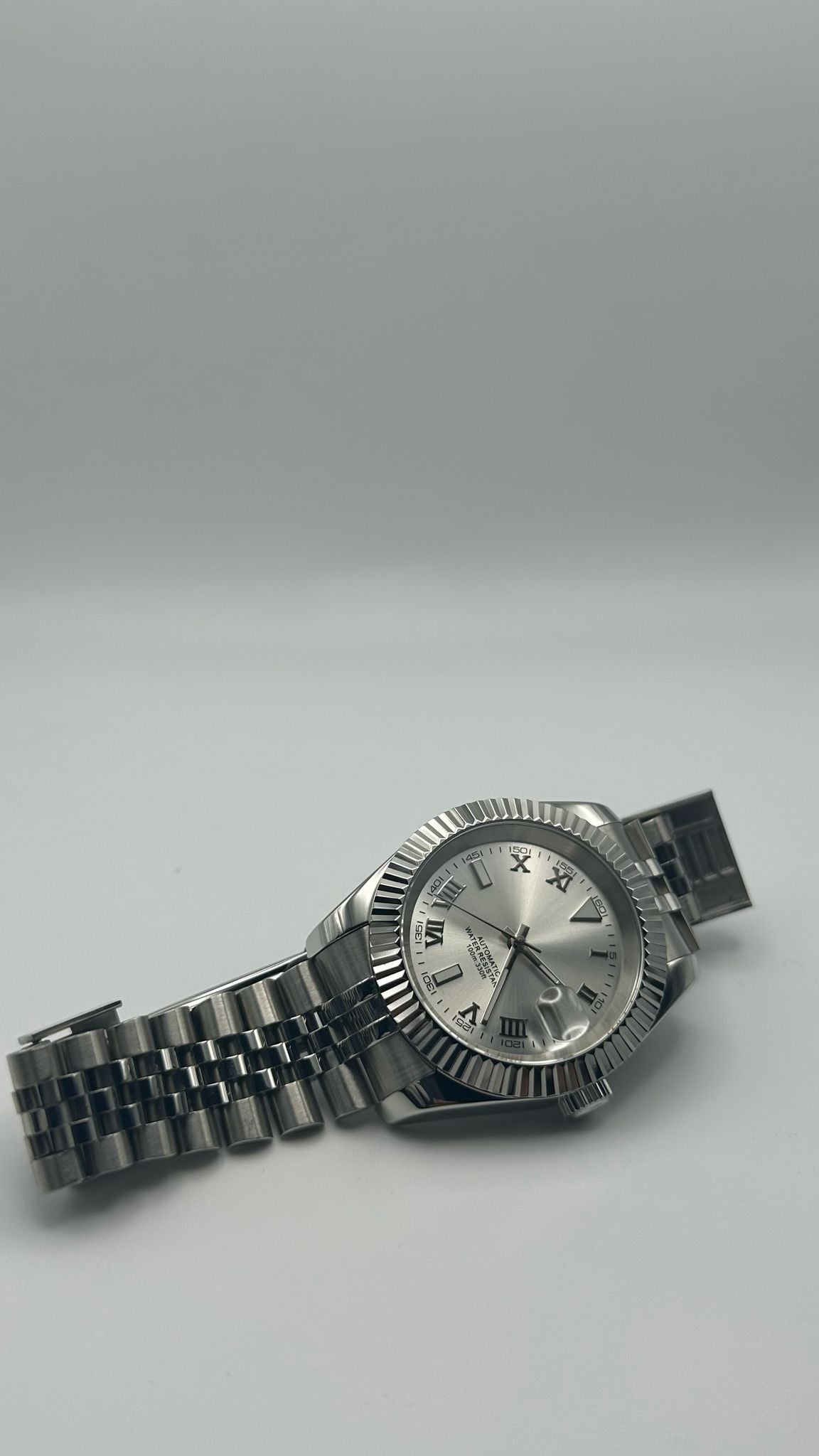 Silver Roman Numeral Dial Watch