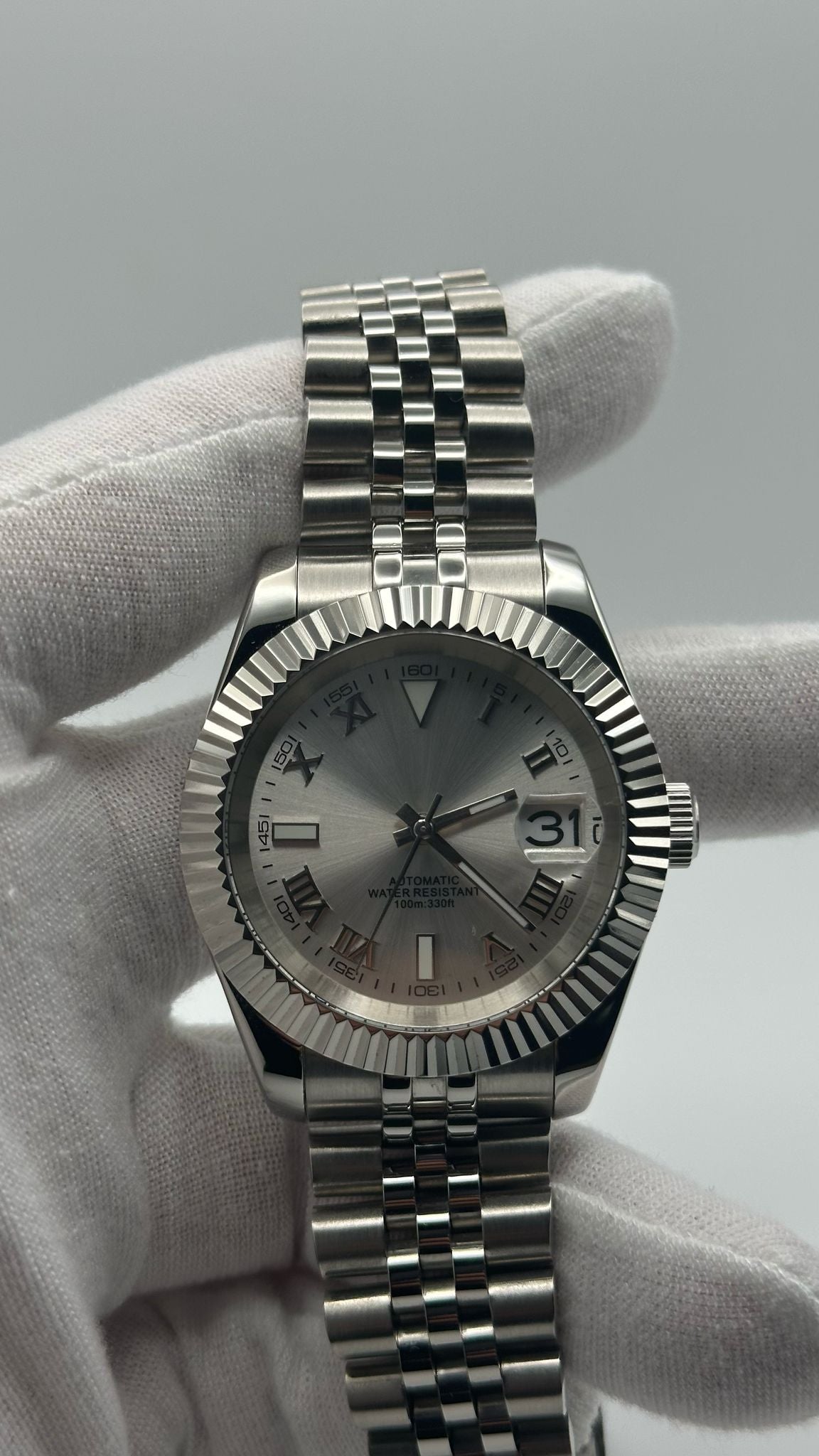 Silver Roman Numeral Dial Watch